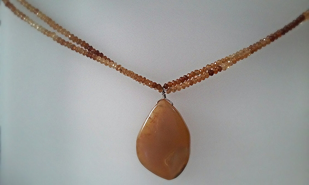 Faceted Hasonite & Quartz Drop